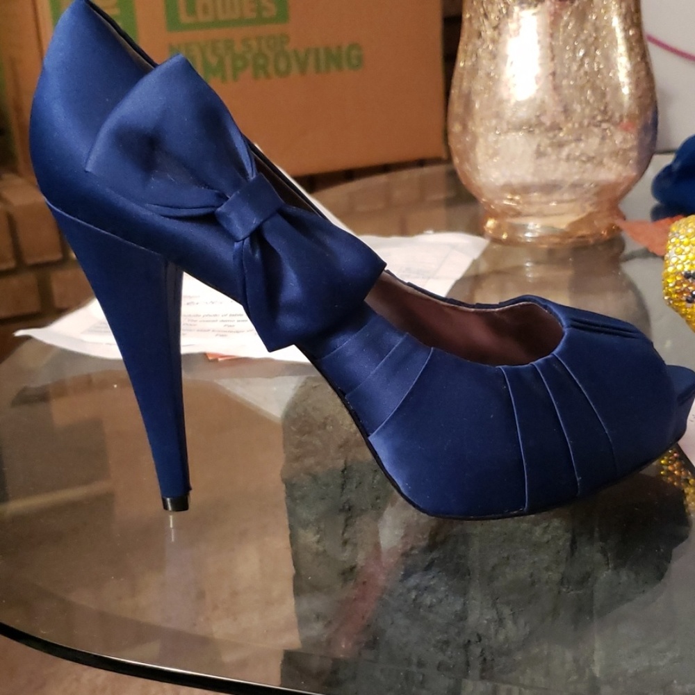 Size 9.5 Paris Hilton Blue Satin shoes.